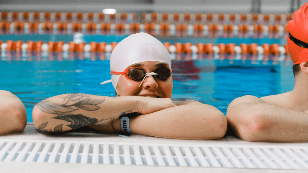 a swimmer wearing a swimming cap