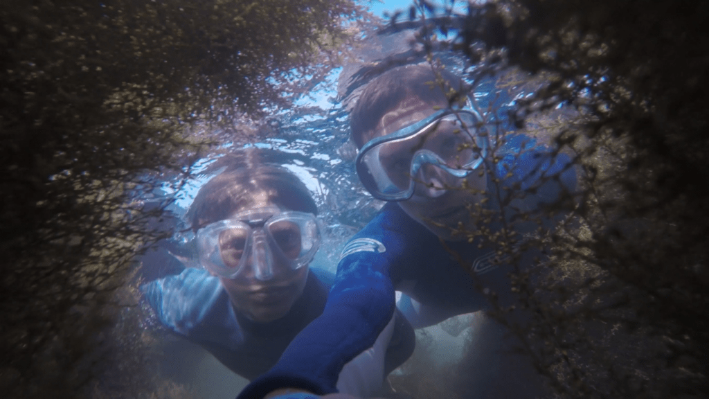 two people with swimming gear