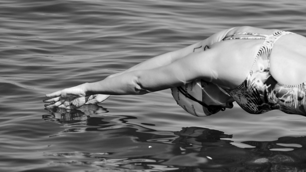 a swimmer doing advance swimming skills