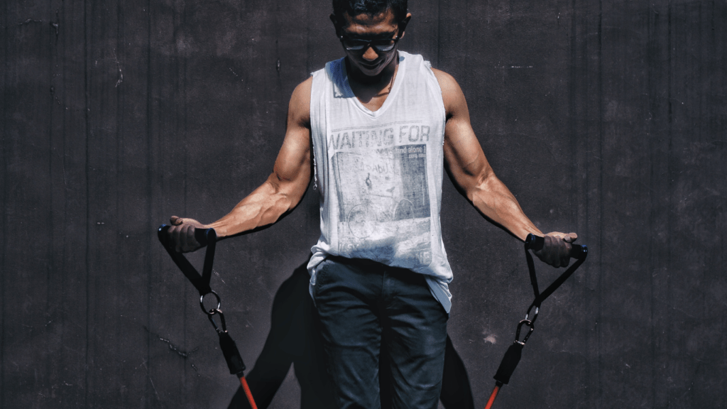 a man using a resistance band for strengthening work out