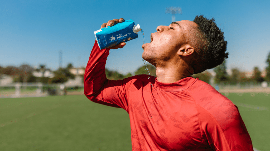 a man hydrating himself