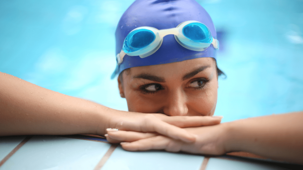 a woman wearing swimming goggles