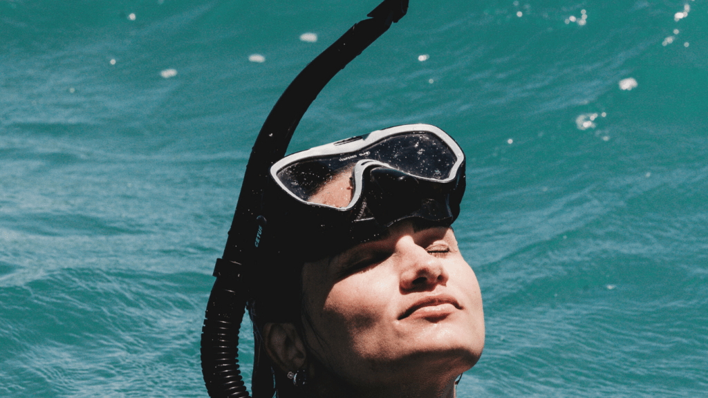 a woman wearing a snorkel