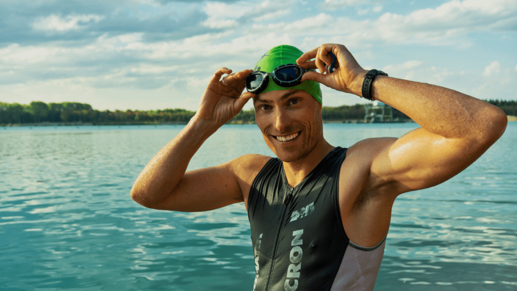 a man wearing swimming drag suit